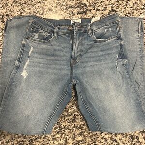 Distressed Blue Jeans